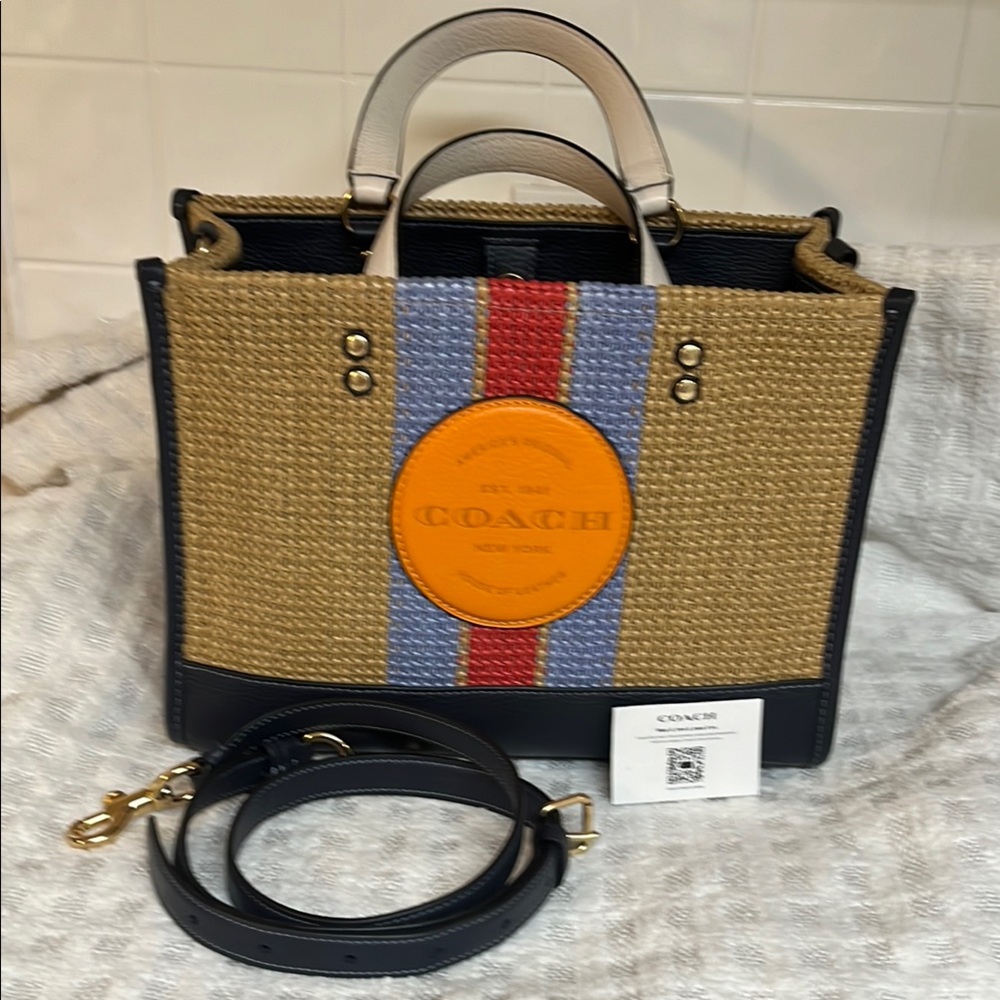 Coach Dempsey Carry all bag. 
Like new only used 1 time.
No marks or stains.
